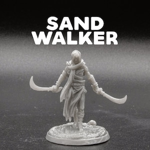 May include: A gray 3D printed miniature figure of a hooded figure holding two scimitars. The figure is standing on a round base with a textured surface. The text "SAND WALKER" is printed above the figure.