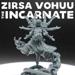 May include: A gray figurine of a multi-armed deity, with the text "ZIRSA VOHUU THE INCARNATE" above. The figure has flowing hair and a detailed dress, standing on a cloud-like base. The figurine is likely a miniature for tabletop gaming.
