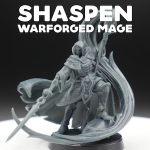 May include: A gray miniature figure of a mage, holding a sword and staff, with the text "SHASPEN WARFORGED MAGE" above. The figure is detailed with a flowing cape and stands on a black base. The overall theme is fantasy.