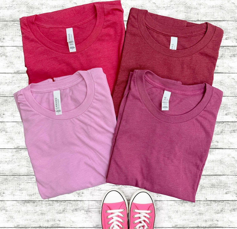Bella Canvas 3001 Heathered Tshirts in various colors.