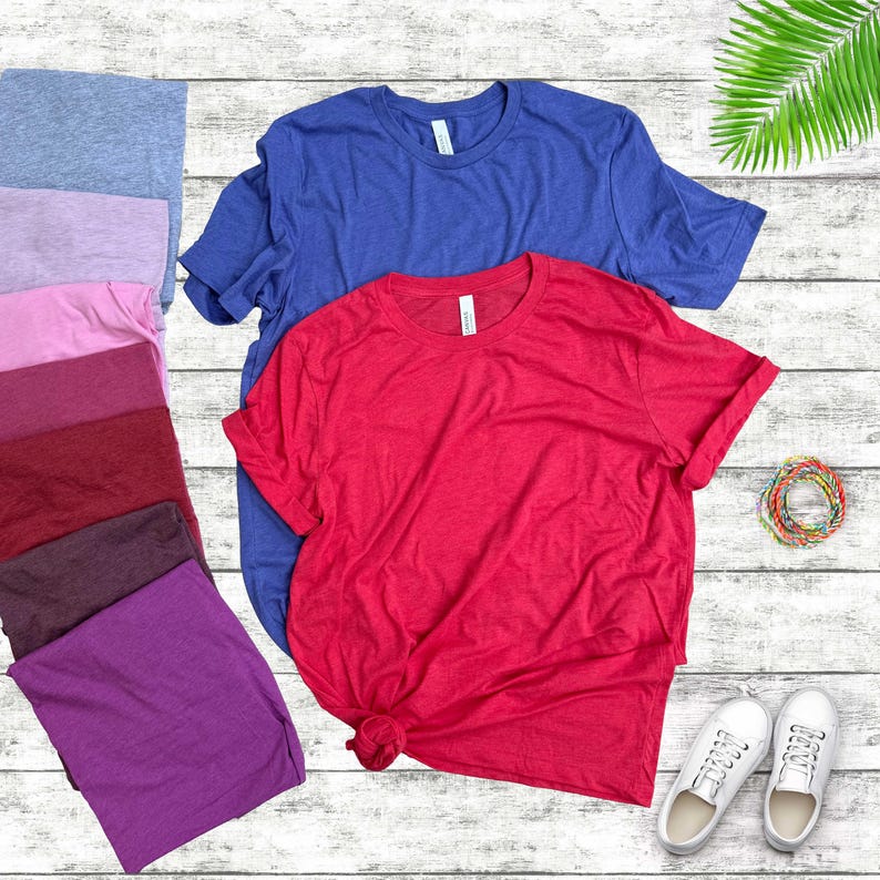 Bella Canvas 3001 Heathered Tshirts in various colors.