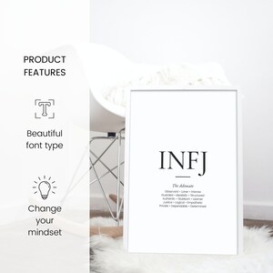 May include: A white framed print with the text "INFJ" in black, followed by "The Advocate" and a list of personality traits. The print is on a white surface with a white chair in the background.