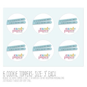 May include: Six 3-inch round edible cookie toppers with a light blue background. Each topper features a pink, yellow, and blue logo that says "candy paper designs". The text on each topper says "Let us design an edible image to match your party theme".