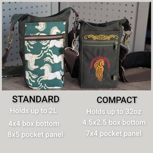 May include: Two olive green canvas crossbody bags with brown straps and gold hardware. The standard bag features a green pocket with a white horse pattern. The compact bag has a yellow embroidered scroll and a red horse head with text.
