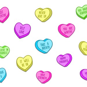 May include: A collection of colorful heart-shaped candies with uplifting messages. Each candy has a different color and a positive phrase such as "Just Breathe," "Self Love," and "You Are Worthy." The candies are scattered on a white background.