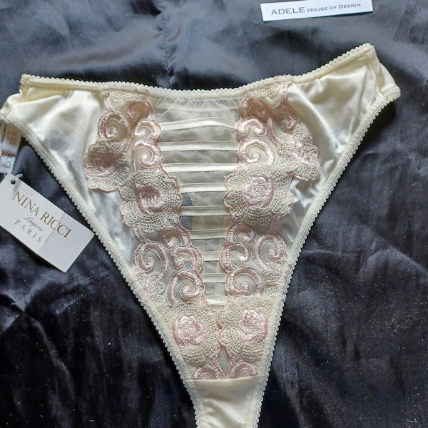 Nina Ricci gorgeous lace lingerie high cut thongs with tags.