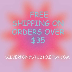 May include: A pink and orange gradient background with the text "FREE SHIPPING ON ORDERS OVER $35" in light blue. The text "SILVERPONYSTUDIO.ETSY.COM" is at the bottom of the image.