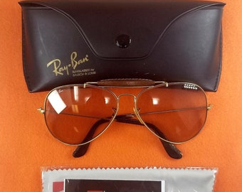 Gafas de aviador vintage Ray-Ban B&L de piel, modelo 1980, con estuche original.