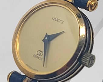 Reloj Gucci 2200L Stack con esfera dorada