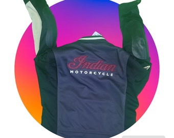 May include: A navy blue motorcycle jacket with a white collar and a red embroidered "Indian Motorcycle" logo on the back.