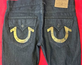 True religion gold logo on flaps jeans