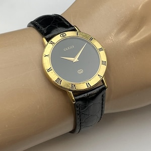 GUCCI 3000 M 腕時計 ウォッチ クォーツ ロゴ ローマン ゴールド色 VINTAGE GUCCI WATCH 3000M Gold Dial Brown Strap | eBay