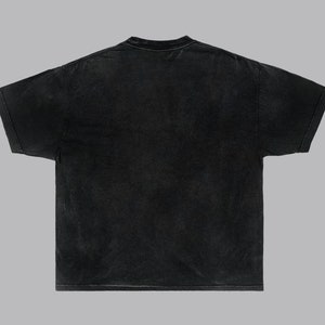 May include: A black t-shirt with a crew neck and short sleeves.