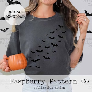 May include: A gray t-shirt with a design of black bats flying in a diagonal line. The text "Raspberry Pattern Co. sublimation design" is at the bottom of the image.