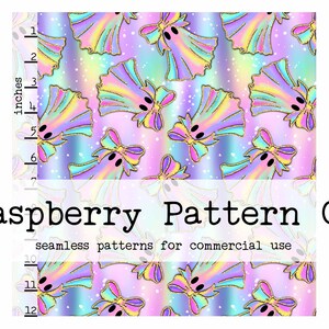 May include: A digital download pattern featuring a repeating design of pastel ghosts with rainbow wings and bows, outlined in gold. The background is a gradient of blues and purples with white speckles. Text includes "Raspberry Pattern Co" and "seamless patterns for commercial use."