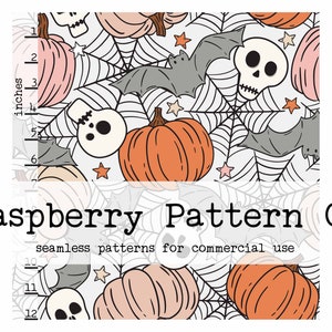 May include: A seamless pattern featuring a white background with orange and pink pumpkins, gray bats, white skulls, and black spiderwebs. The text "Raspberry Pattern Co. seamless patterns for commercial use" is at the bottom of the image.
