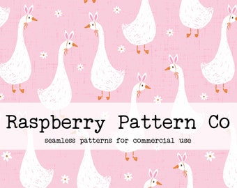 May include: A seamless pattern featuring white geese with bunny ears on a pink background with white flowers. The text "Raspberry Pattern Co. seamless patterns for commercial use" is at the bottom of the image.