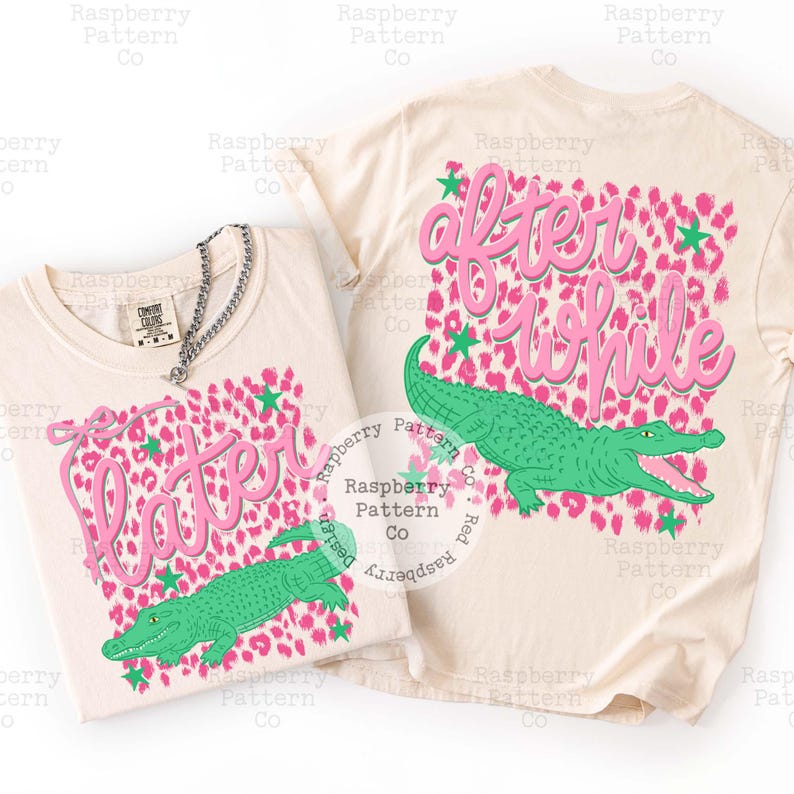 May include: Two cream-colored t-shirts with the text "Later" and "After a While" in pink script, along with a green alligator graphic. The shirts feature a pink leopard print background with green stars.