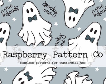 Può includere: Uno schema senza cuciture con simpatici fantasmi che indossano papillon su uno sfondo blu chiaro. Lo schema include il testo "Spooky one" e "Spooky two".