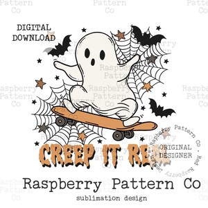 May include: A Halloween-themed digital download design featuring a cartoon ghost riding a skateboard. The ghost is white, with black eyes and mouth, and the skateboard is brown. The design includes bats, spiderwebs, stars, and the text "CREEP IT REAL".
