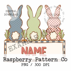 May include: A digital download of a printable design featuring three bunny silhouettes with a personalised name banner. The bunnies are in blue, green, and red gingham patterns. The banner is white with blue and red stripes and a name in pink.