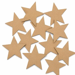 May include: A collection of eleven brown paper star cutouts, each with five points, scattered on a white background. The stars vary slightly in size and are made of a natural, unpainted material, suitable for crafts and decorations.