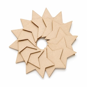 May include: A circular arrangement of light brown, star-shaped cutouts. The stars are layered to create a three-dimensional effect, with a central circular opening. The design is set against a clean white background, highlighting the geometric pattern.