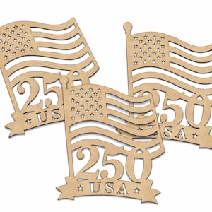 May include: Three light brown wooden cutouts shaped like waving American flags. Each cutout features the number 250, the letters USA, and small star cutouts. The designs are flat, laser-cut wood pieces with a natural, unfinished matte texture.