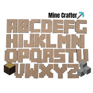 May include: A set of wooden alphabet blocks in the style of the popular video game Minecraft. The blocks are brown and have a pixelated design. The letters are in uppercase and are arranged in alphabetical order. The set also includes a wooden block with a pickaxe symbol and a stack of gray blocks.