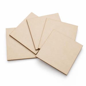 May include: A collection of five square, unfinished wooden craft pieces. The light brown squares are arranged in a slightly overlapping fan shape, showcasing their smooth, unpainted surfaces. Ideal for DIY projects, these wooden squares offer a blank canvas for creativity.