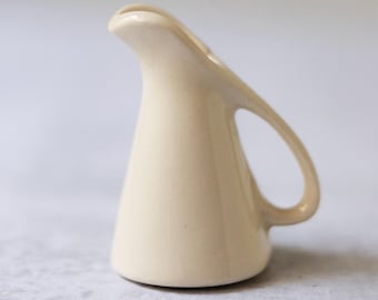 Vintage white pottery miniature mini creamer pitcher handmade?