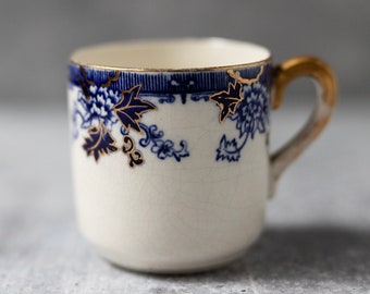 Vintage blue white demitasse porcelain cup gold trim