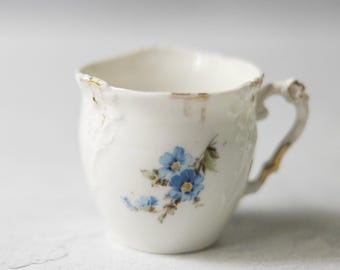 Vintage European miniature mini demitasse cup with forget-me-nots and other flowers