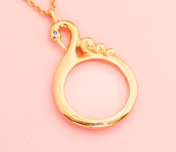 vintage avon magnifying glass necklace