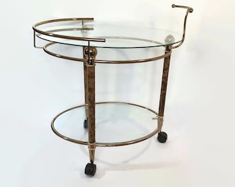 Unique mid century gold brass glass bar cart | Vintage Hollywood regency oval trolley side coffee table