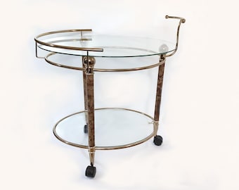 Unique mid century gold brass glass bar cart | Vintage Hollywood regency oval trolley side coffee table