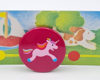 1 piece button 'Unicorn', Ø 38 mm, to the pin. A small gift for children.