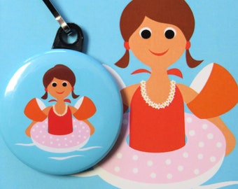 Button pendant 'Girl in the sea' with carabiner hook, Ø 37 mm, a small pendant for the backpack or swimming bag