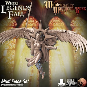 May include: A detailed sculpture of a winged figure holding a sword, with the text "Where Legends Fall" and "Maidens of the Martyred Rose." The figure is adorned with a star-shaped halo. The words "Multi Piece Set" are also visible.