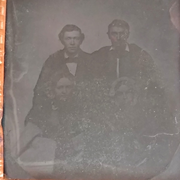 Antique ambrotype glass plate photo. Two couples photo on glass plate, wrapped in embossed copper foil. Size is 3 1/4" x 2 3/4".