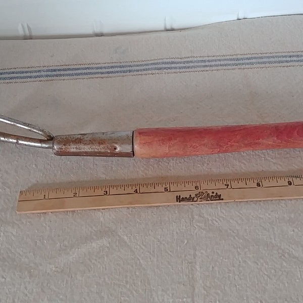 Vintage hand held garden cultivator. Flower garden digging tool. 15" long overall. Worn red paint on wooden handle. Light surface rust.