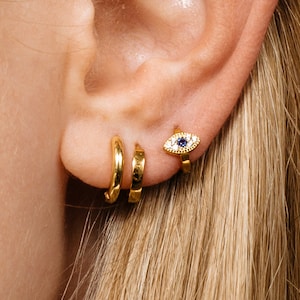 Boucle d'oreille cartilage mauvais œil 18 g • boucle d'oreille hélice supérieure mauvais œil • boucles d'oreilles lobe • boucles d'oreilles tragus • empilement d'oreilles • boucles d'oreilles minimalistes