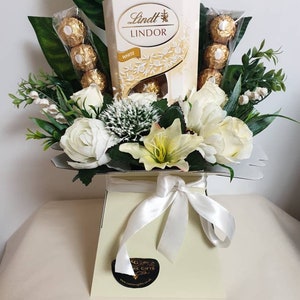 Crema de ramo de chocolate Lindt Ferrero Impresionante cesta de regalo de flores de seda