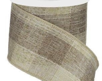 May include: A roll of decorative ribbon with a plaid pattern in shades of beige and brown. The ribbon is made of a textured material and is ideal for crafts, gift wrapping, and seasonal decorations.