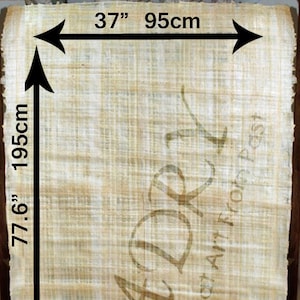 May include: A beige papyrus scroll with the text "El Badry" and "Great Art from Past" printed on it. The scroll measures 77.6 inches by 37 inches, or 195 cm by 95 cm.