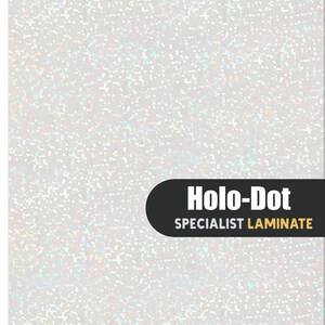 May include: A white sheet with a holographic dot pattern that reflects light in various colors. A black rectangular label in the lower right corner features the white text "Holo-Dot" and the yellow text "SPECIALIST LAMINATE".