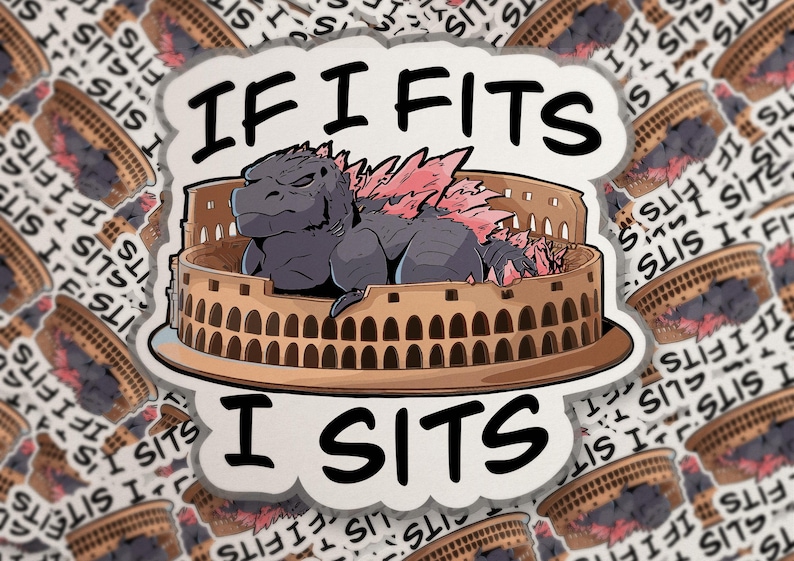 May include: A die-cut sticker featuring a gray monster with pink dorsal fins sitting inside a tan, circular stone amphitheater. The text "IF I FITS" is printed in black above the monster, and "I SITS" is printed in black below the amphitheater.