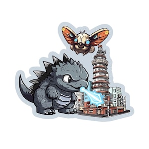 May include: A sticker featuring a grey, spiky, bipedal creature breathing a blue energy beam toward a city building. Above the creature, a brown, moth-like insect with large blue eyes hovers in the air. The design has a white border outline.