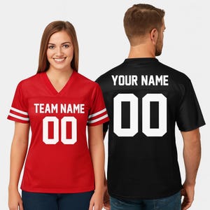 A woman wearing a red jersey with the text "TEAM NAME 00" and a man wearing a black jersey with the text "YOUR NAME 00" printed on them.