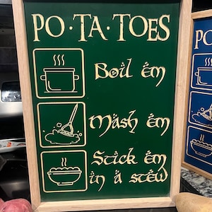 Potatoes! Boil em, mash em, stick em in a stew! Solid wood Kitchen sign! Carved lettering! Oak wood framed sign.